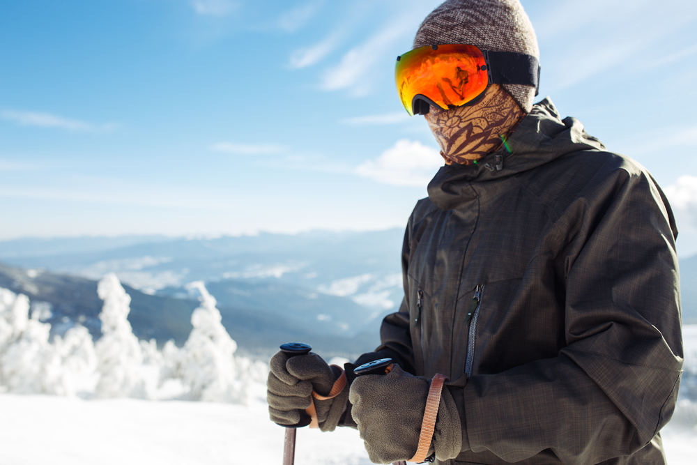 Man having the right ski equipment for a cold day